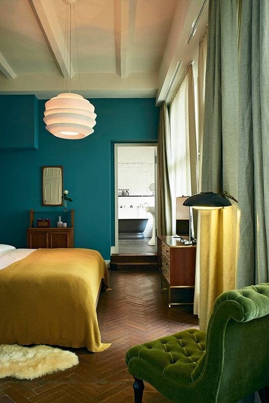 Slaapkamer met groene accenten